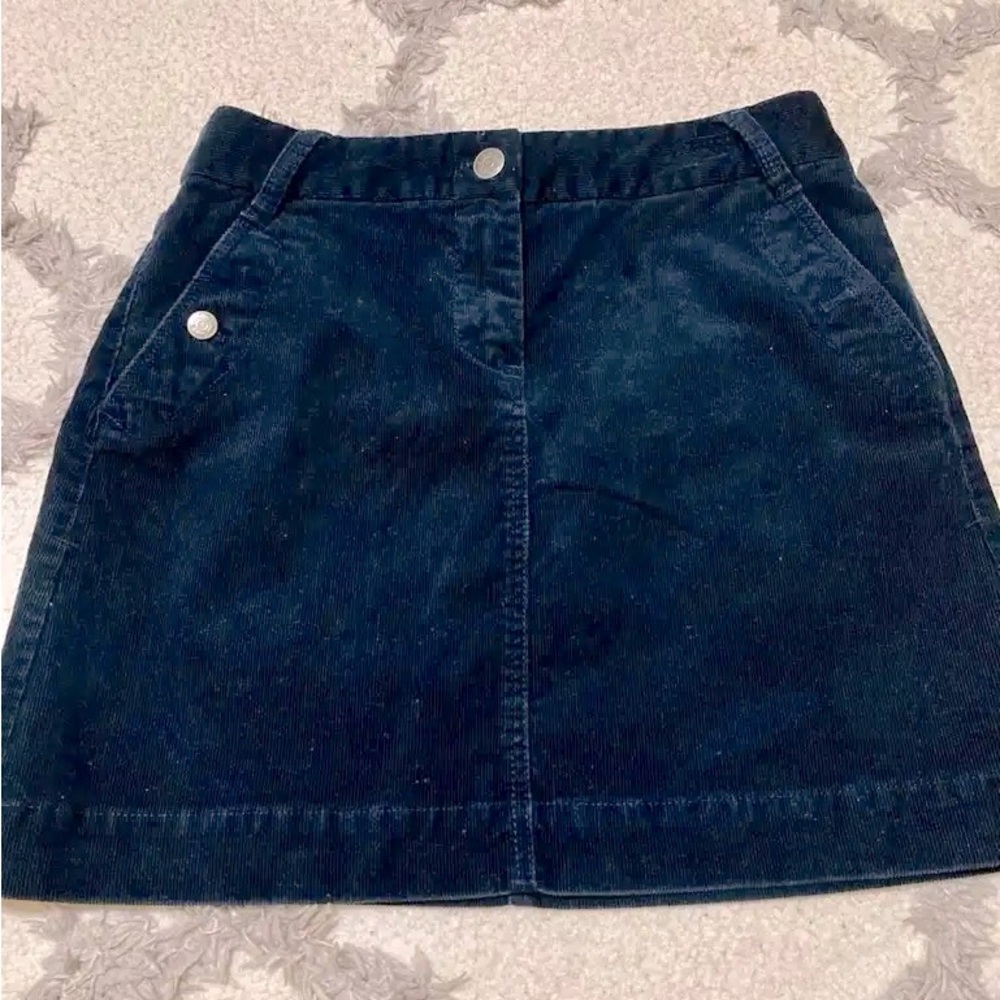 JCrew women’s Navy Skirt size 4 mini corduroy with side pockets.